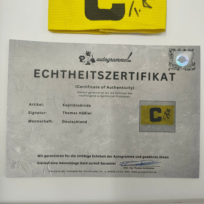 Kapitänsbinde Thomas Häßler signiert im Rahmen DFB Fußball Autogramm COA