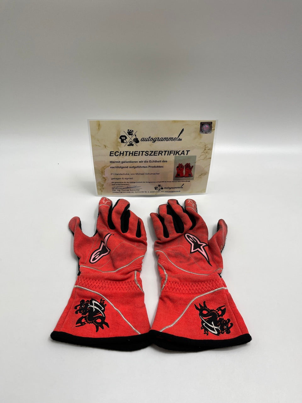 Michael Schumacher Formula 1 original worn driver gloves signed COA