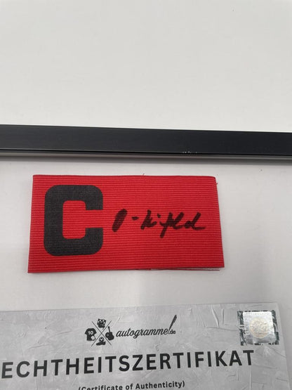 Captain's armband signed by Ottmar Hitzfeld in a Borussia Dortmund autograph COA frame