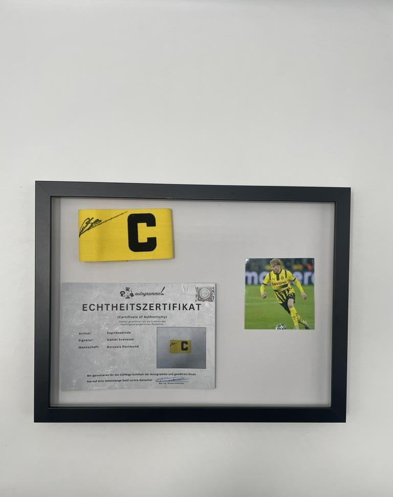 Captain's armband signed by Daniel Svensson in a Borussia Dortmund autograph COA frame