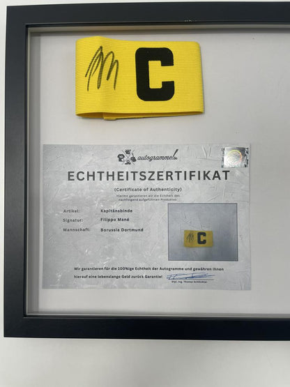 Captain's armband signed by Filippo Mané in a Borussia Dortmund autograph COA frame