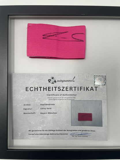 Captain's armband signed by Leroy Sane in a Bayern Munich autograph frame