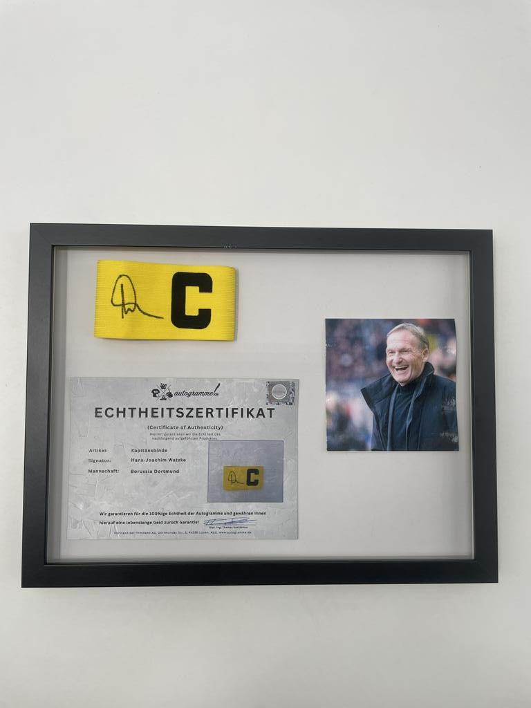 Captain's armband signed by Hans-Joachim Watzke as part of the Borussia Dortmund COA