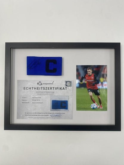 Captain's armband signed by Florian Wirtz in a Bayer Leverkusen autograph frame