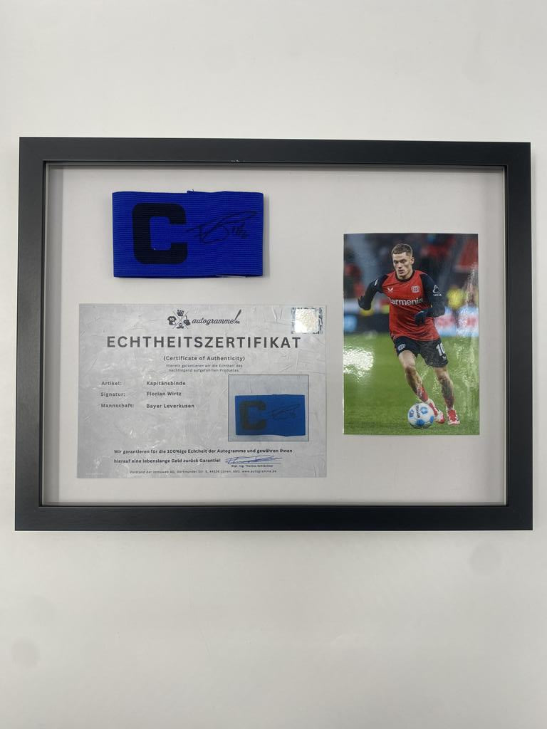 Captain's armband signed by Florian Wirtz in a Bayer Leverkusen autograph frame