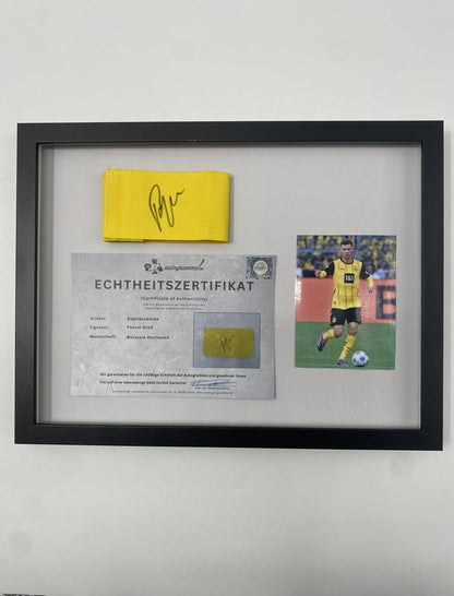 Captain's armband signed by Pascal Groß in a Borussia Dortmund autograph COA frame