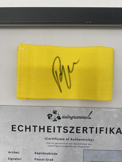 Captain's armband signed by Pascal Groß in a Borussia Dortmund autograph COA frame