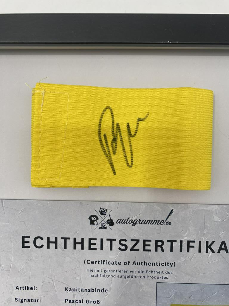 Captain's armband signed by Pascal Groß in a Borussia Dortmund autograph COA frame