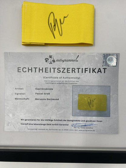 Captain's armband signed by Pascal Groß in a Borussia Dortmund autograph COA frame