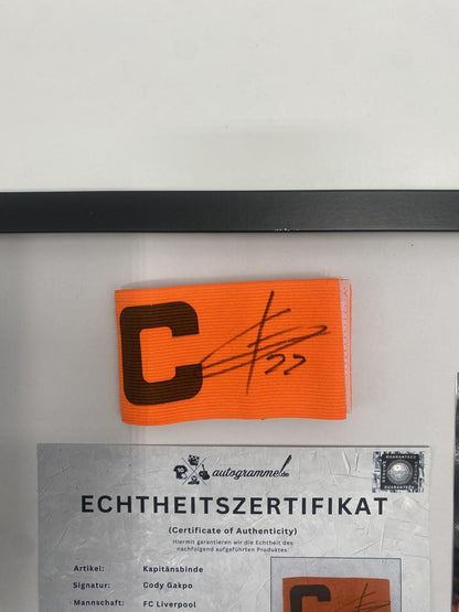 Captain's armband signed by Cody Gakpo in a frame FC Liverpool autograph COA