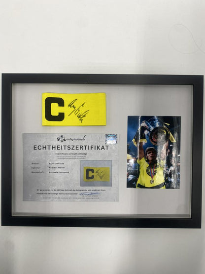 Captain's armband signed by Andreas Möller in a BVB autograph COA frame