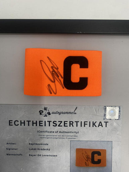 Captain's armband signed by Lukáš Hrádecký in a frame, Bayer 04 Leverkusen autograph