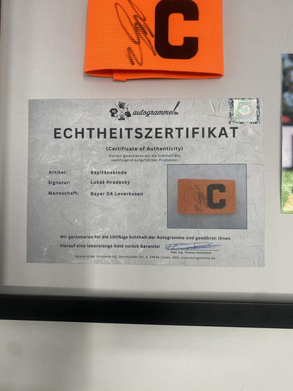 Captain's armband signed by Lukáš Hrádecký in a frame, Bayer 04 Leverkusen autograph