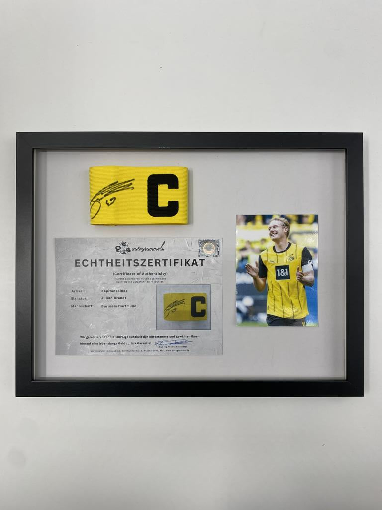 Captain's armband signed by Julian Brandt in a Borussia Dortmund autograph COA frame