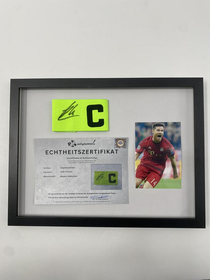 Captain's armband signed by Xabi Alonso in a Bayern Munich autograph COA frame
