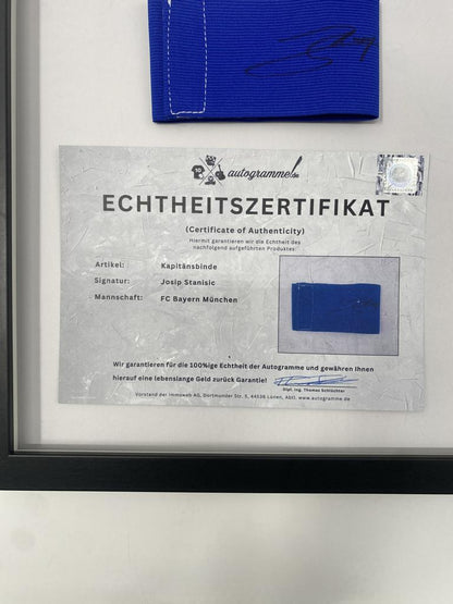 Captain's armband Josip Stanisic signed in a Bayern Munich football autograph frame