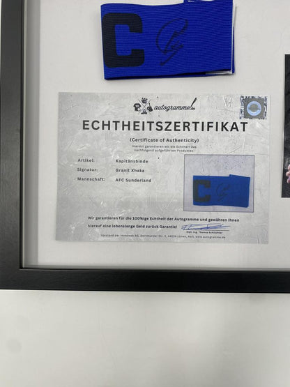 Captain's armband signed by Granit Xhaka in a frame, AFC Sunderland autograph