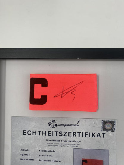 Captain's armband signed by Xavi Simons in a frame, Tottenham Hotspur