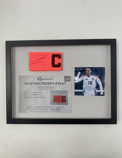 Captain's armband signed by Jamal Musiala in a Bayern Munich football autograph frame