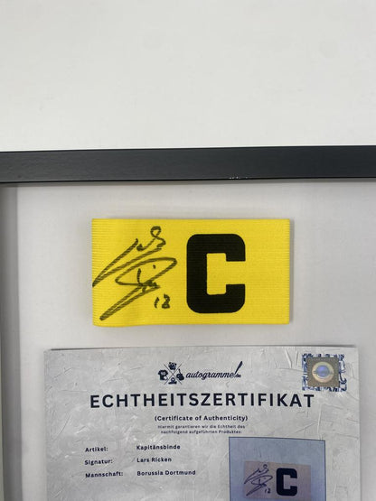 Captain's armband signed by Lars Ricken as part of the Borussia Dortmund COA