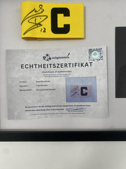 Captain's armband signed by Lars Ricken as part of the Borussia Dortmund COA