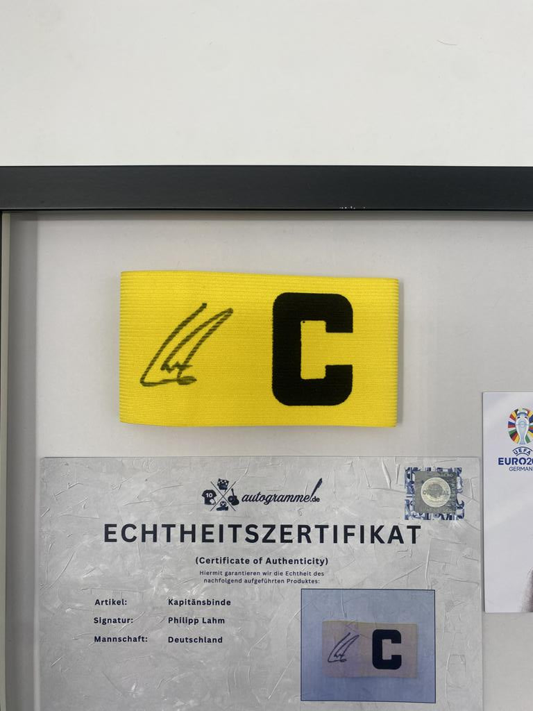 Captain's armband signed by Philipp Lahm as part of a Germany Football Autograph