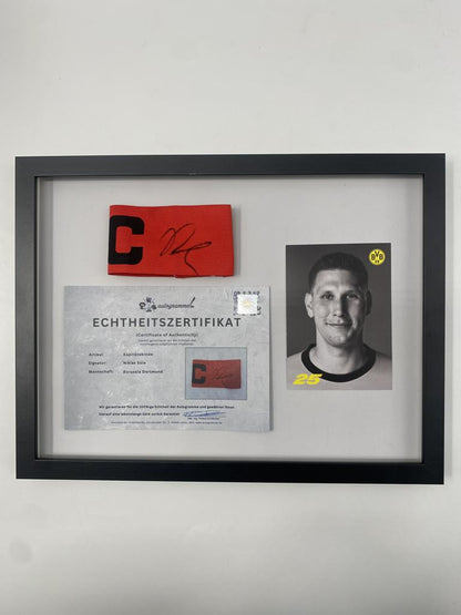 Captain's armband signed by Niklas Süle as part of the Borussia Dortmund COA football campaign