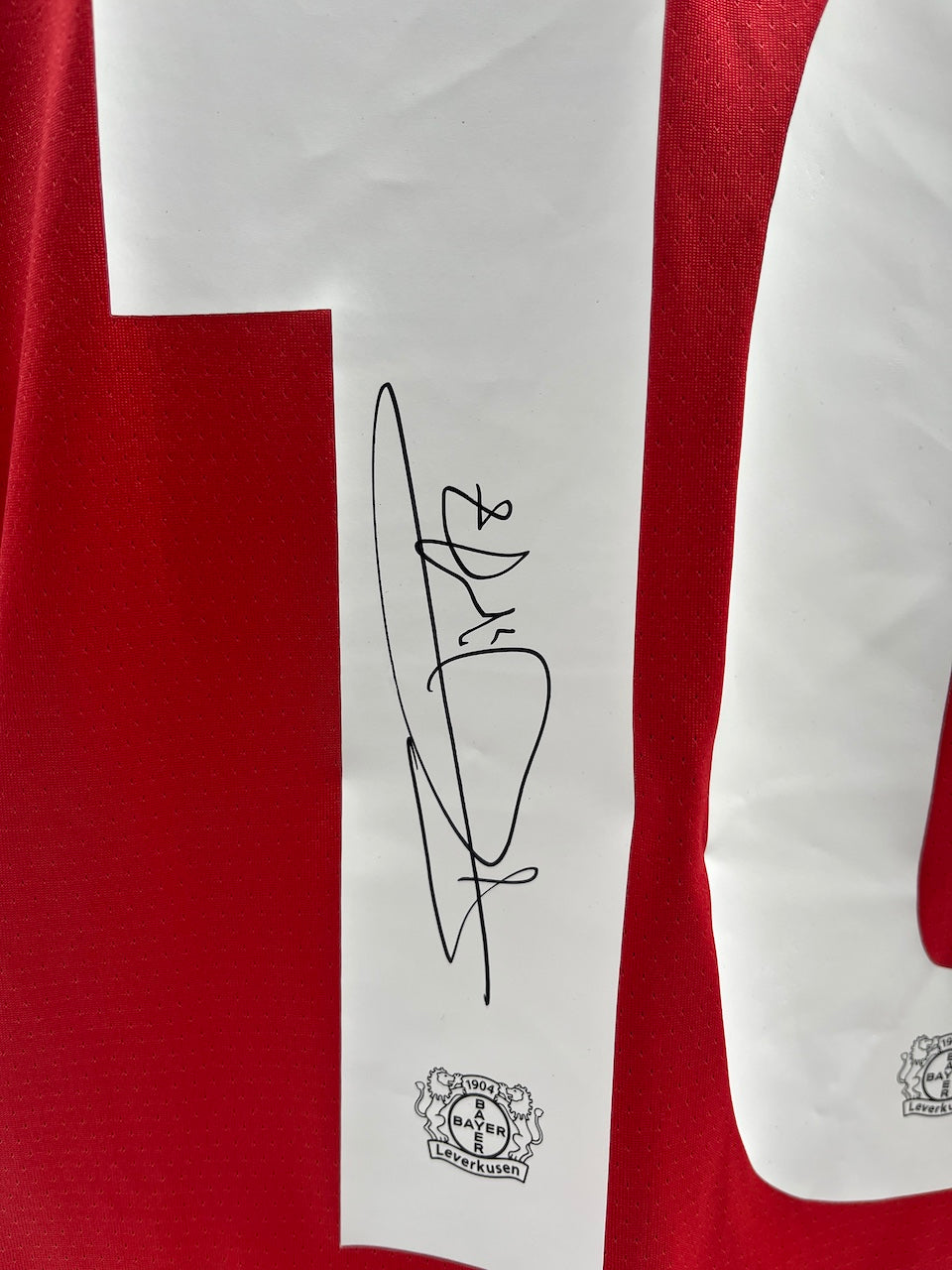 Match-worn Leverkusen jersey worn and signed by Florian Wirtz on August 10, 2024