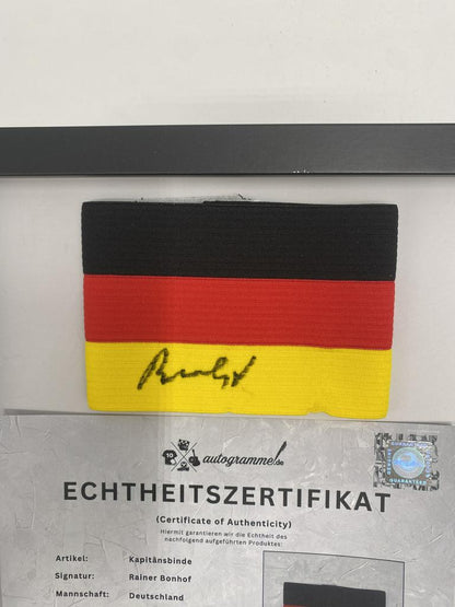 Captain's armband signed by Rainer Bonhof, framed in Germany COA