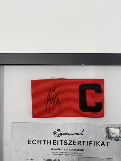 Captain's armband signed by Mohamed Amoura in a frame, Algeria Autograph COA
