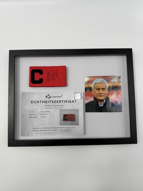 Kapitänsbinde Armin Veh signiert im Rahmen 1. FC Köln Autogramm