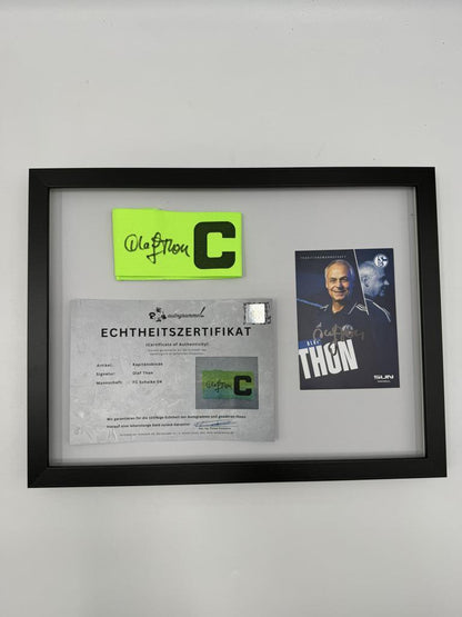 Kapitänsbinde Olaf Thon signiert im Rahmen Schalke 04 COA
