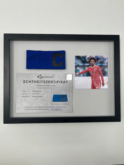 Captain's armband signed by Leroy Sane in a Bayern Munich autograph frame