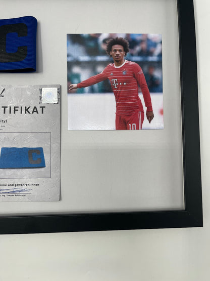 Captain's armband signed by Leroy Sane in a Bayern Munich autograph frame