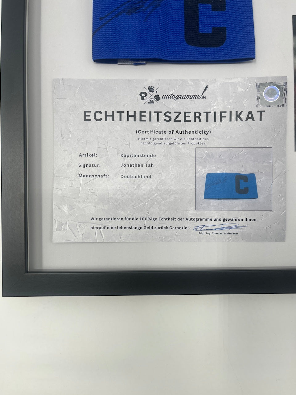 Captain's armband Jonathan Tah signed as part of the DFB Football Autograph series
