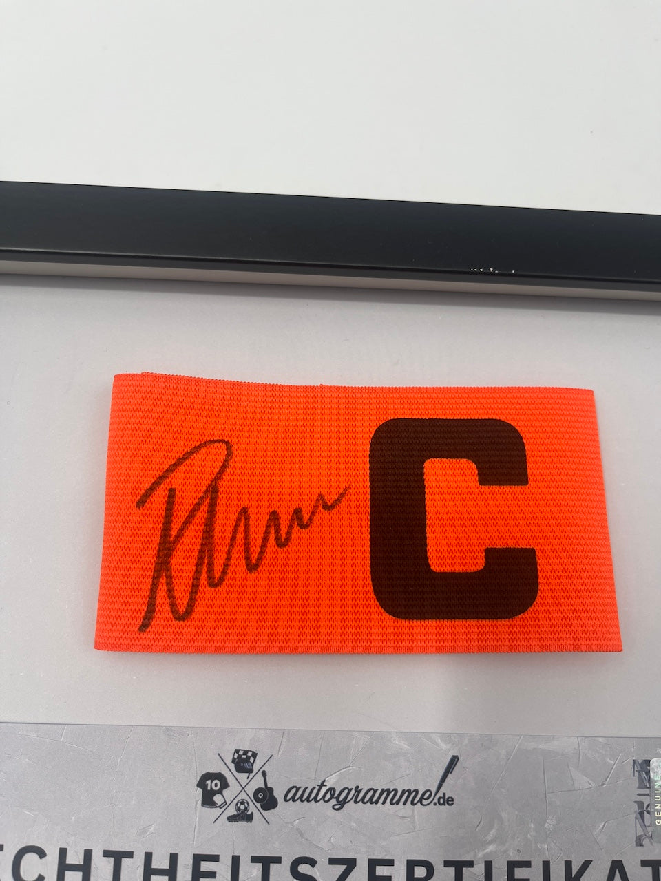 Captain's armband signed by Paul Wanner in a frame, Heidenheim autograph