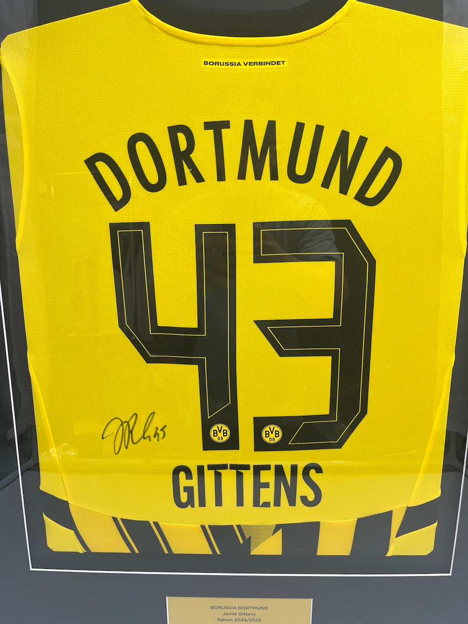 Borussia Dortmund jersey signed by Jamie Gittens in a Puma BVB frame