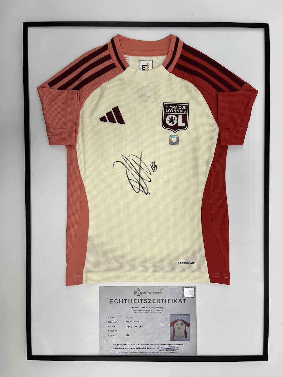 Olympique Lyon jersey signed by Rayan Cherki in an Adidas football frame, item number 128