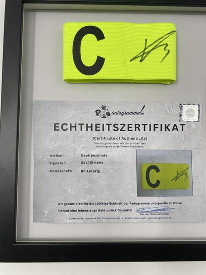 Captain's armband signed by Xavi Simons in a frame RB Leipzig autograph