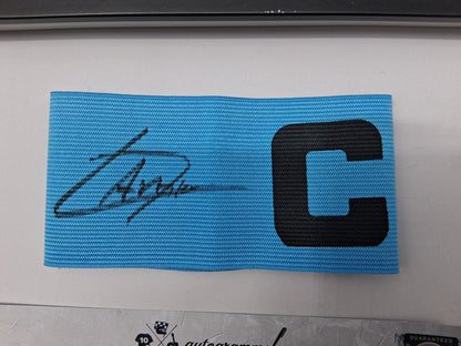 Captain's armband signed by Lamine Yamal in a framed FC Barcelona COA autograph