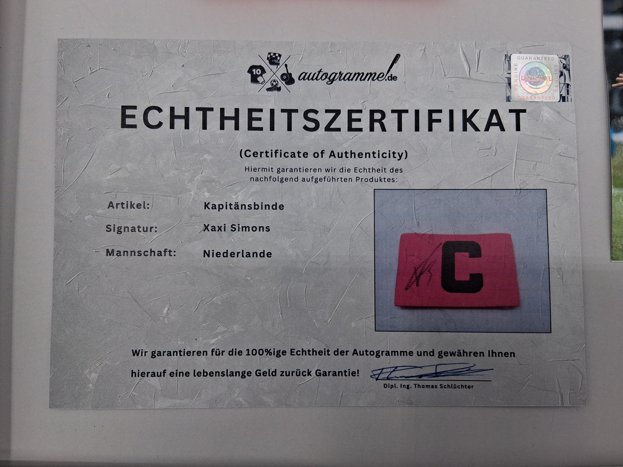 Captain's armband signed by Xavi Simons in a frame, Netherlands Autograph