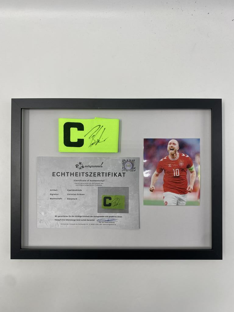 Captain's armband signed by Christian Eriksen in a frame Denmark Autograph