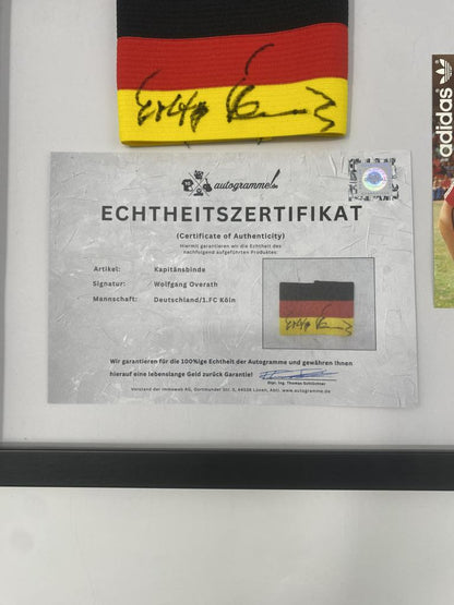 Kapitänsbinde Wolfgang Overath signiert im Rahmen Deutschland/1.FC Köln COA