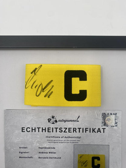 Kapitänsbinde Andreas Möller signiert im Rahmen BVB Autogramm COA