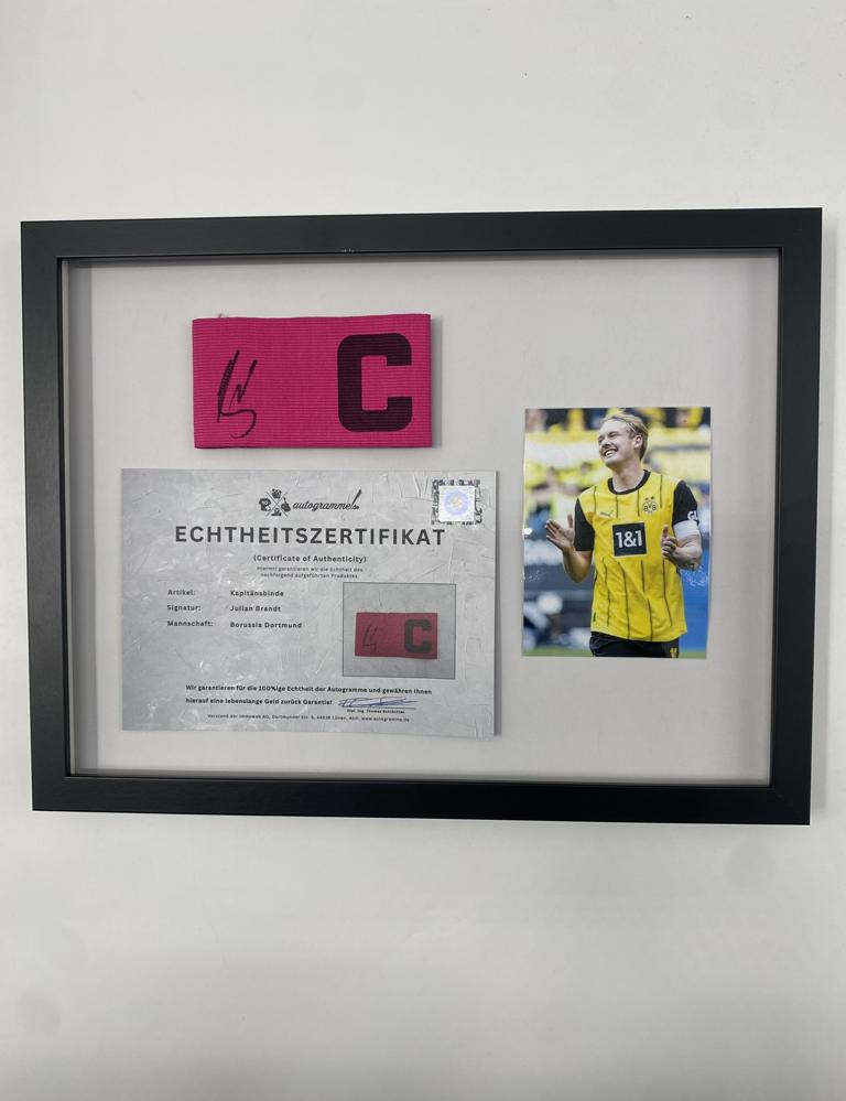 Captain's armband signed by Julian Brandt as part of the Borussia Dortmund COA football campaign
