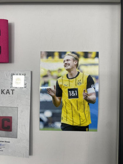 Captain's armband signed by Julian Brandt as part of the Borussia Dortmund COA football campaign