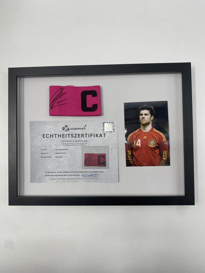 Captain's armband signed by Xabi Alonso in a frame, Spain, autograph COA