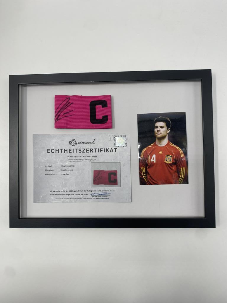 Captain's armband signed by Xabi Alonso in a frame, Spain, autograph COA