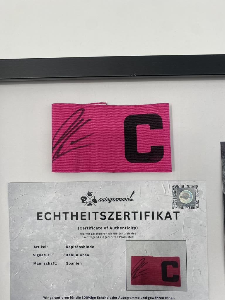 Captain's armband signed by Xabi Alonso in a frame, Spain, autograph COA