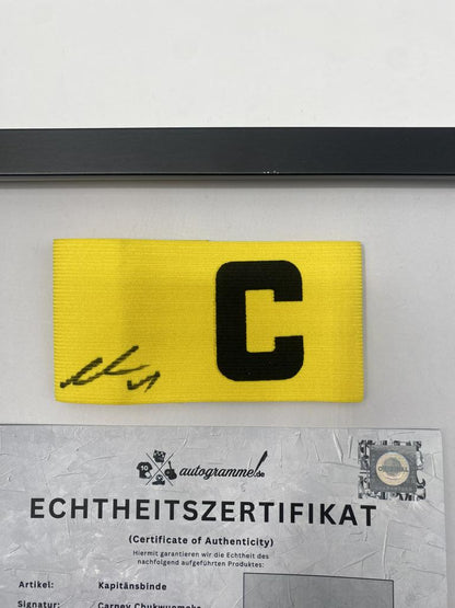 Captain's armband signed by Carney Chukwuemeka in a Borussia Dortmund autograph frame